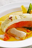 Souffléed salmon in a carrot and chicory broth with ravioli