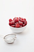 Fresh raspberries with icing sugar