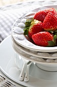 Fresh strawberries on white plate