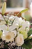 White bouquet of gerbera daisies, roses, carnations and lilies