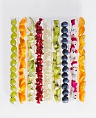 Various types of fruit in test tubes