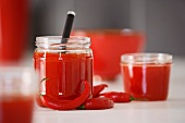 Pepper and chilli chutney in jars