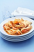 Pancakes with smoked salmon and glasses of vodka