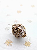 Christmas bauble decorated in silver and gold