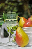 Pears and a white wine glass