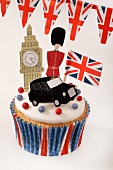 A cupcake decorated with London icons