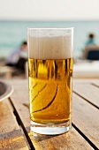 Glass of Beer on an Outdoor Deck