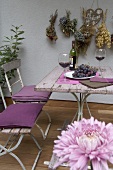 Garden table with red wine