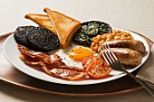 English breakfast with black pudding and a fried egg