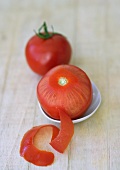 Partially peeled tomato