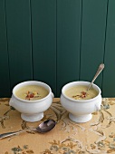 Cream of cauliflower soup in small soup bowls