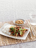 Stir-fried chicken with bok choy, peanuts and rice