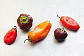 Assorted Fresh Peppers on White