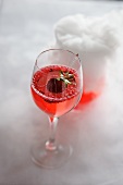 A champagne cocktail with poppy seeds - molecular gastronomy