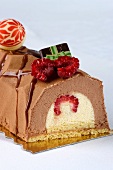 A yule log with raspberries for Christmas