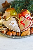 Dish of nuts and Christmas decorations