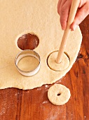 Doughnuts being cut out
