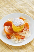 White chocolate souffle with vineyard peaches and champagne jelly