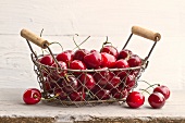 Cherries in a wire basket
