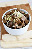 Marinated diced seitan with chopped ginger and garlic
