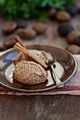 Chestnut and chocolate mousse with cinnamon sticks