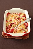 Strawberry crumble in a baking dish