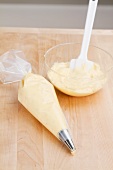 French buttercreme in a piping bag