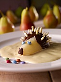 Pear hedgehog on vanilla sauce