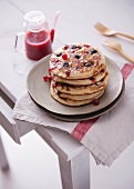 A stack of berry pancakes