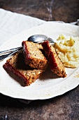 Slices of Vegetarian Meatloaf on a Plate with Mashed Potatoes