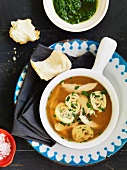 Zuppa perugina (soup with pancake rolls and a herb sauce)