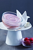 Layered mousse au chocolat and raspberry mousse desserts
