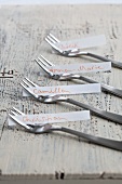 Name tags on cake forks