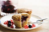 Shortbread pies with berries and jam