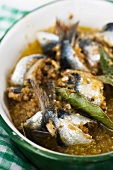 Sardines stuffed with bay leaves