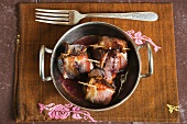 Figs wrapped in bacon with goats cheese and garam masala