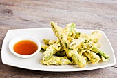 Asparagus tempura with sauce