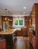 Hardwood floors and cabinets in kitchen