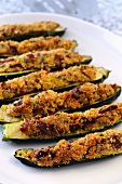 Courgettes filled with breadcrumbs, bacon and cheese