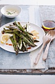 Grilled asparagus with sauce