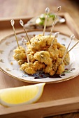 Fried oyster kebabs