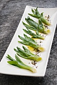 Cooked daylilies with lemon oil