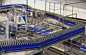 Filled mineral water bottles on a conveyor belt in Estonia