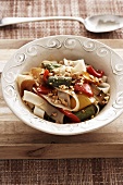 Tagliatelle with sweet and sour vegetables and peanuts
