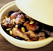 Chicken tagine with prunes, honey and almonds (Morocco)