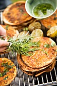 Grilled pita breads with chermoula and basil oil