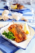 Stuffed and breaded fillets of anchovies