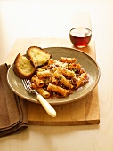 Pasta Bolognese with Fresh Grated Parmesan and Garlic Bread; Glass of Wine