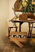 Wooden table and chairs with bar mounted cork remover