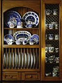 China collection in antique kitchen dresser